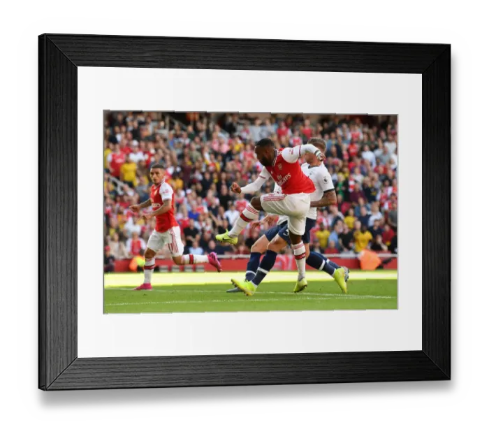 Framed Print : Alexandre Lacazette Scores the Opener: Arsenal Triumphs over Tottenham in Intense Premier League Clash (2019-20)