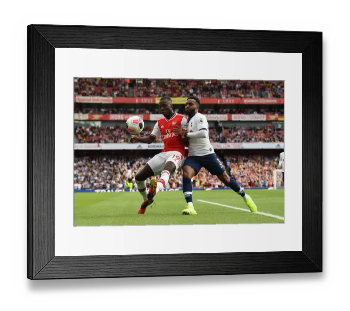 Framed Print : Pepe vs. Rose: A Football Rivalry Ignites in Arsenal vs. Tottenham Showdown