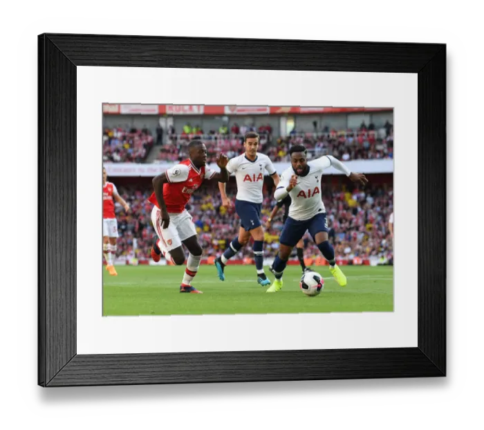 Framed Print : Arsenal vs. Tottenham: Pepe vs. Rose in Intense Premier League Clash Framed Print : Arsenal vs. Tottenham: Pepe vs. Rose in Intense Premier League Clash