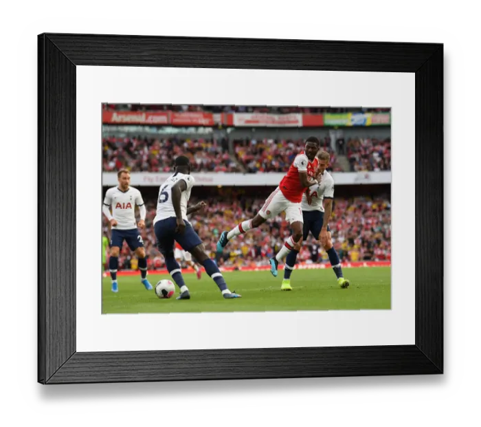 Framed Print : Arsenal vs. Tottenham: A Battle of Wits - Maitland-Niles vs. Alderweireld, Premier League Showdown at Emirates Stadium (2019-20)