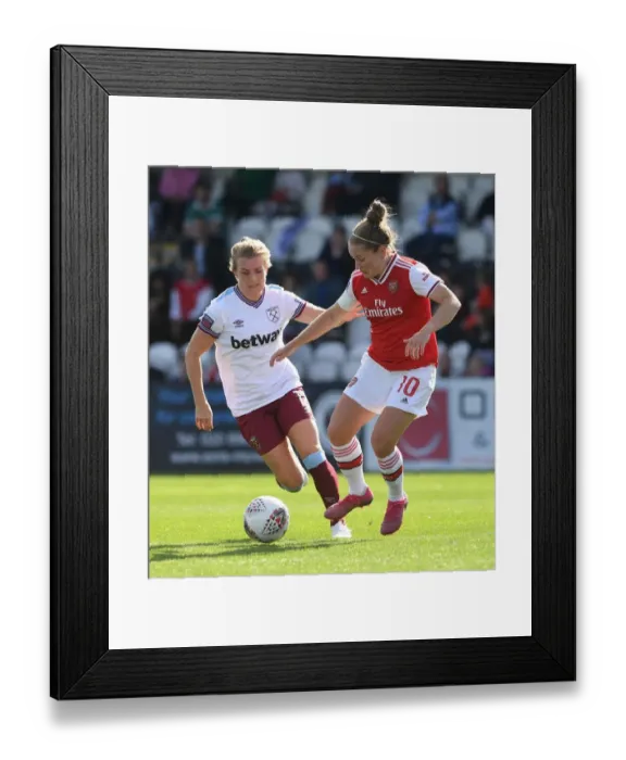 Framed Print : Clash of the Midfield Maestros: Kim Little vs. Kate Longhurst - Arsenal Women vs. West Ham United WSL Showdown Framed Print : Clash of the Midfield Maestros: Kim Little vs. Kate Longhurst - Arsenal Women vs. West Ham United WSL Showdown