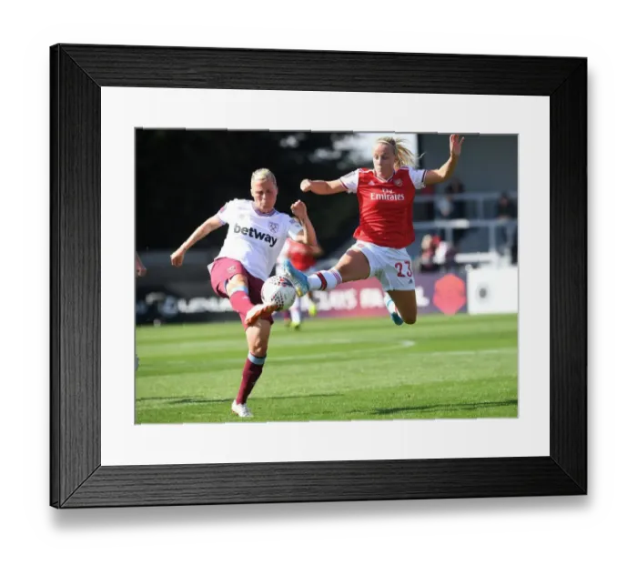 Framed Print : Intense Rivalry: Beth Mead vs. Gilly Flaherty - Arsenal Women vs. West Ham United Football Match