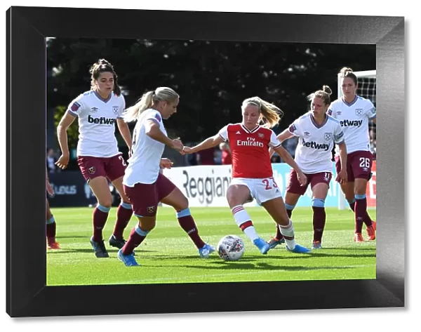 Intense Battle: Arsenal Women vs. West Ham United in the WSL - Beth Mead Faces Off Against Kathrina Baunach and Adriana Leon