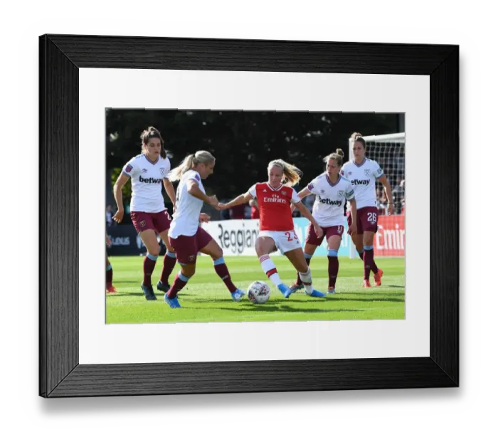 Framed Print : Intense Battle: Arsenal Women vs. West Ham United in the WSL - Beth Mead Faces Off Against Kathrina Baunach and Adriana Leon