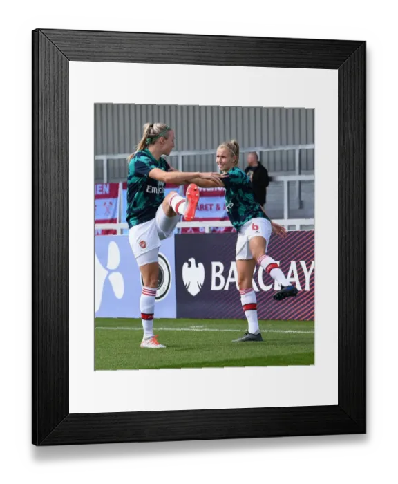 Framed Print : Arsenal Women Warm Up Ahead of West Ham United Clash in WSL Action