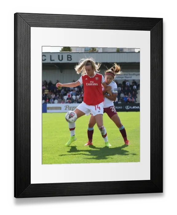 Framed Print : Arsenal Women vs. West Ham United: A Tight WSL Showdown - Jill Roord Fends Off Opponent