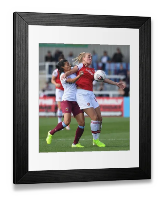 Framed Print : Arsenal Women vs. West Ham United: A Battle in the WSL