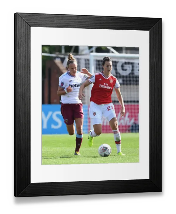 Framed Print : Schnaderbeck vs. Thomas: A Star-Studded Showdown in Women's Football - Arsenal vs. West Ham United Framed Print : Schnaderbeck vs. Thomas: A Star-Studded Showdown in Women's Football - Arsenal vs. West Ham United