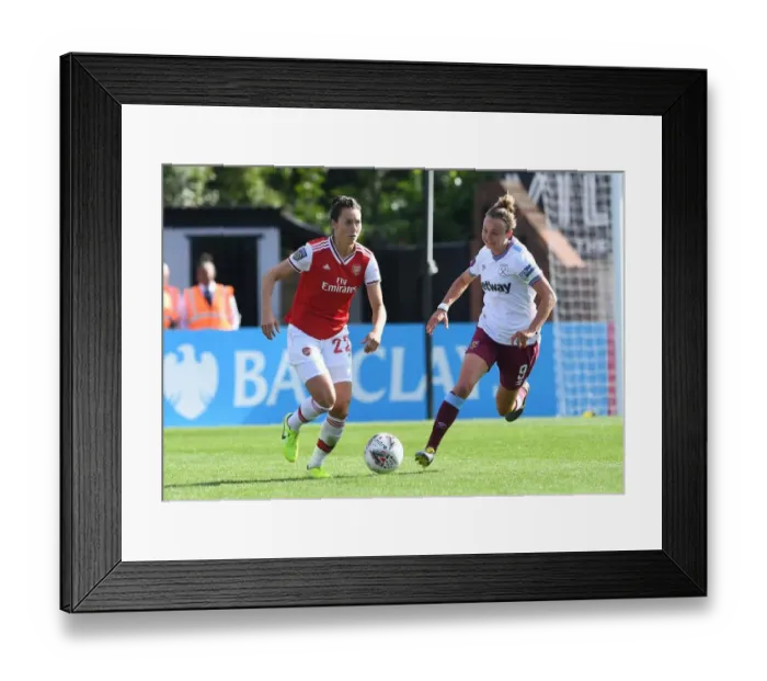 Framed Print : Arsenal vs. West Ham Women: A Fierce Battle in the WSL - Schnaderbeck vs. Thomas Clash at Meadow Park Framed Print : Arsenal vs. West Ham Women: A Fierce Battle in the WSL - Schnaderbeck vs. Thomas Clash at Meadow Park