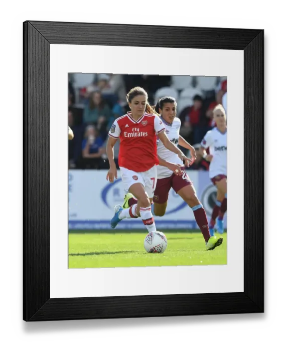 Framed Print : Arsenal Women vs. West Ham United: A Star-Studded Showdown - Van de Donk vs. Dali in the WSL