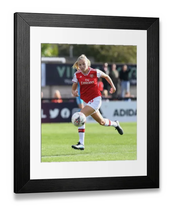 Framed Print : Arsenal's Leah Williamson vs. West Ham's Kate Longhurst: A Battle in the WSL