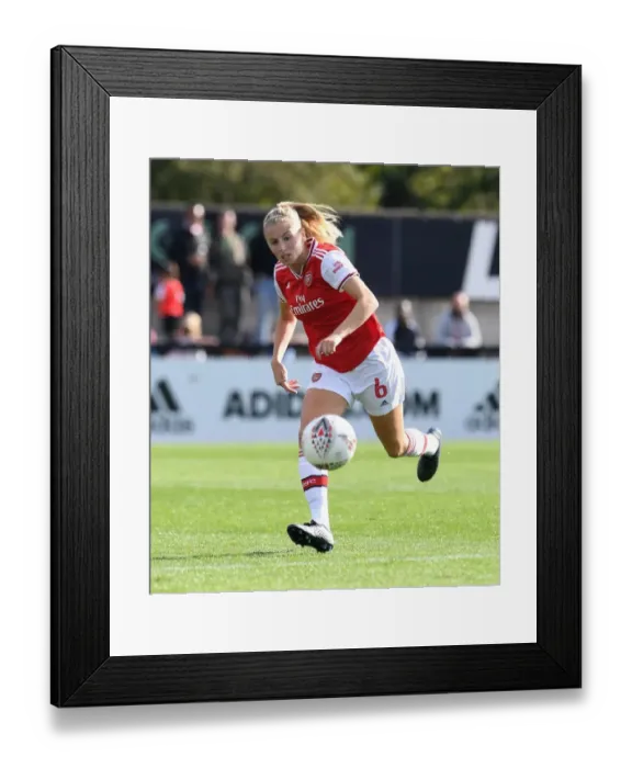 Framed Print : Arsenal vs. West Ham Women: A Battle in the WSL