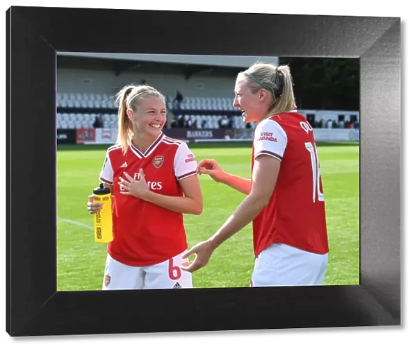 Arsenal Women vs West Ham United: Leah Williamson and Louise Quinn Share a Moment After Match