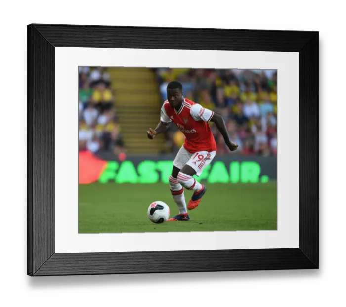 Framed Print : Pepe in Action: Arsenal's Star Winger Dazzles Against Watford in Premier League 2019-20