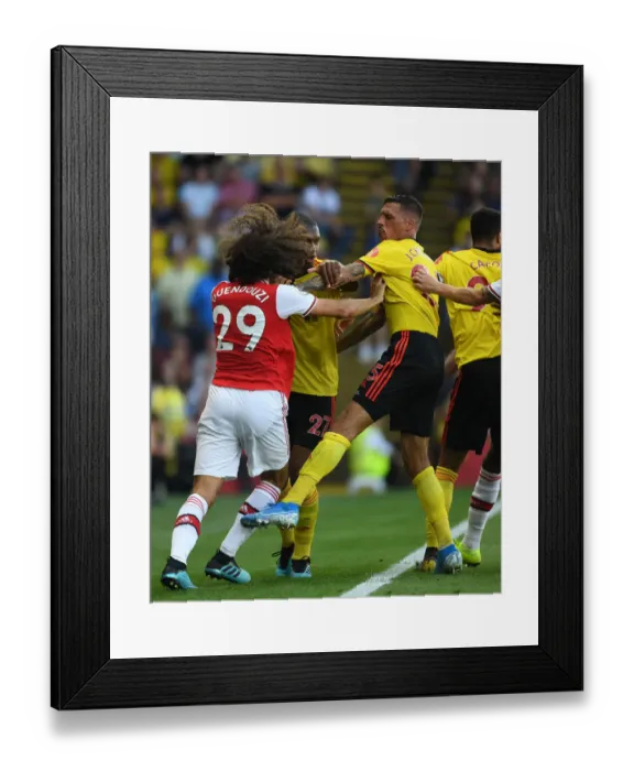 Framed Print : Clash ofStyles: Guendouzi vs. Holebas - Watford vs. Arsenal, Premier League 2019-20