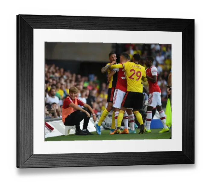 Framed Print : Intense Rivalry: Holebas, Capoue, and Xhaka Clash Heats Up in Watford vs Arsenal Match
