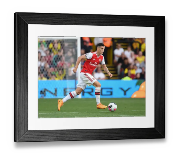 Framed Print : Granit Xhaka: Arsenal's Midfield Maestro Shines in Premier League Clash vs. Watford