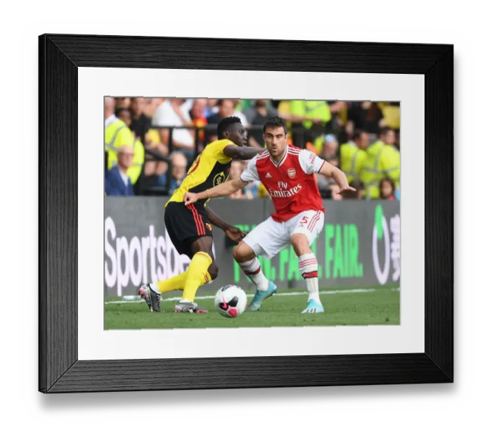 Framed Print : Sokratis vs Sarr: A Footballing Battle in the Watford vs Arsenal Premier League Clash (2019-20)