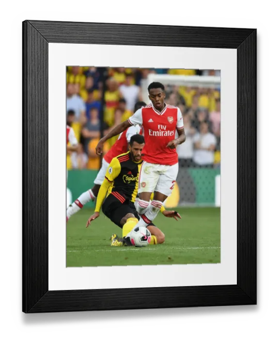 Framed Print : Joe Willock's Game-Changing Surge Past Capoue: A Key Moment in Arsenal's Victory over Watford (2019-20 Premier League)