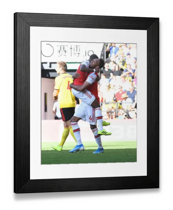 Framed Print : Arsenal's Aubameyang and Maitland-Niles: Celebrating a Victory Over Watford (2019-20) Framed Print : Arsenal's Aubameyang and Maitland-Niles: Celebrating a Victory Over Watford (2019-20)
