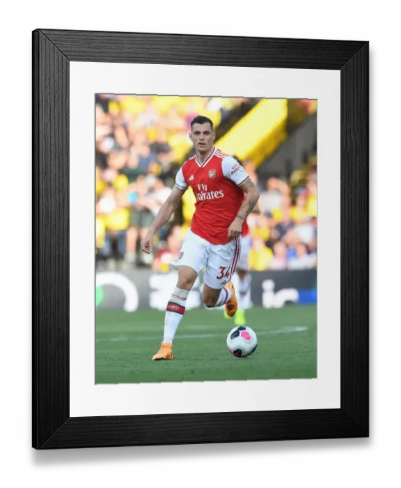 Framed Print : Granit Xhaka's Midfield Maestro Performance: Arsenal's Victory Over Watford (2019-20) Framed Print : Granit Xhaka's Midfield Maestro Performance: Arsenal's Victory Over Watford (2019-20)