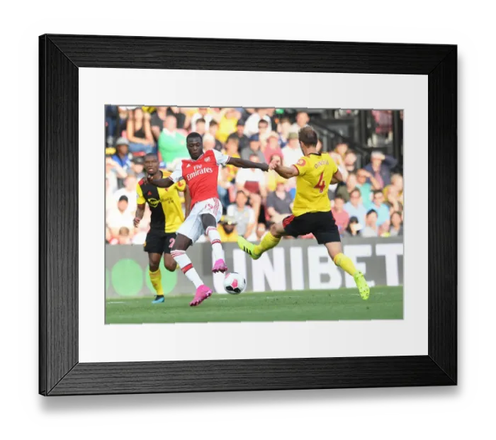 Framed Print : Watford vs Arsenal: Pepe vs Dawson Clash in Premier League Showdown Framed Print : Watford vs Arsenal: Pepe vs Dawson Clash in Premier League Showdown