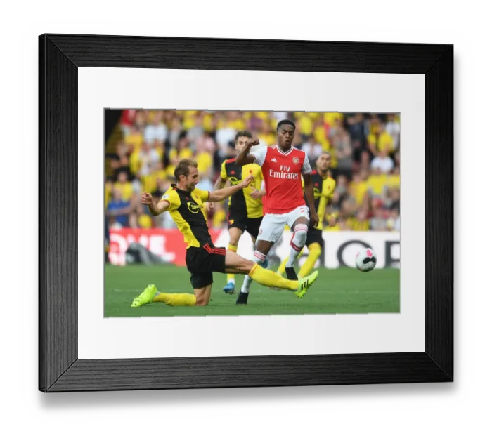 Framed Print : Clash of the Titans: Joe Willock vs Craig Dawson - Premier League Showdown between Arsenal and Watford Framed Print : Clash of the Titans: Joe Willock vs Craig Dawson - Premier League Showdown between Arsenal and Watford