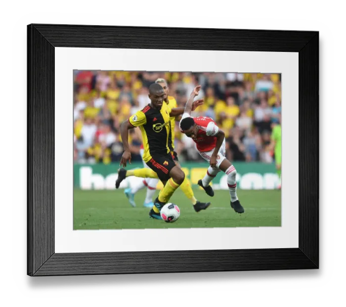 Framed Print : Watford vs Arsenal: Clash between Willock and Kabasele in Premier League Showdown Framed Print : Watford vs Arsenal: Clash between Willock and Kabasele in Premier League Showdown