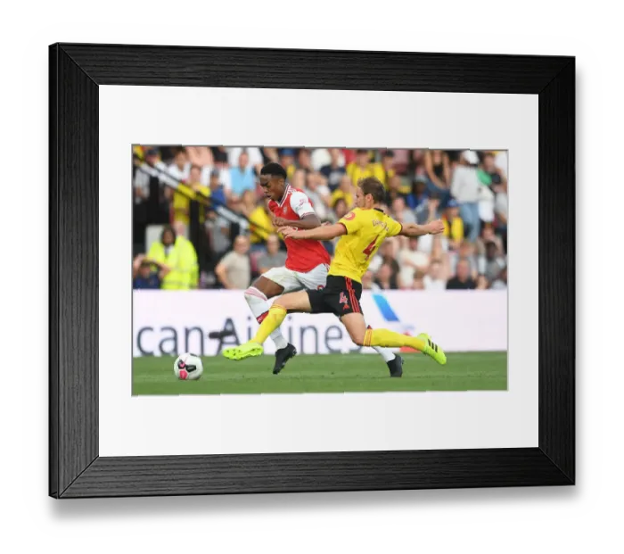Framed Print : Clash of the Titans: Joe Willock vs Craig Dawson - A Premier League Battle at Vicarage Road