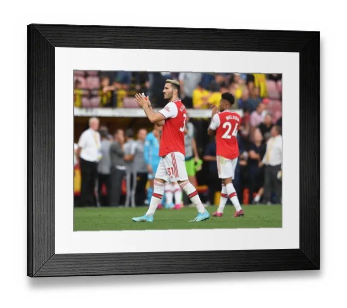 Framed Print : Arsenal's Sead Kolasinac Celebrates with Fans: Victory over Watford