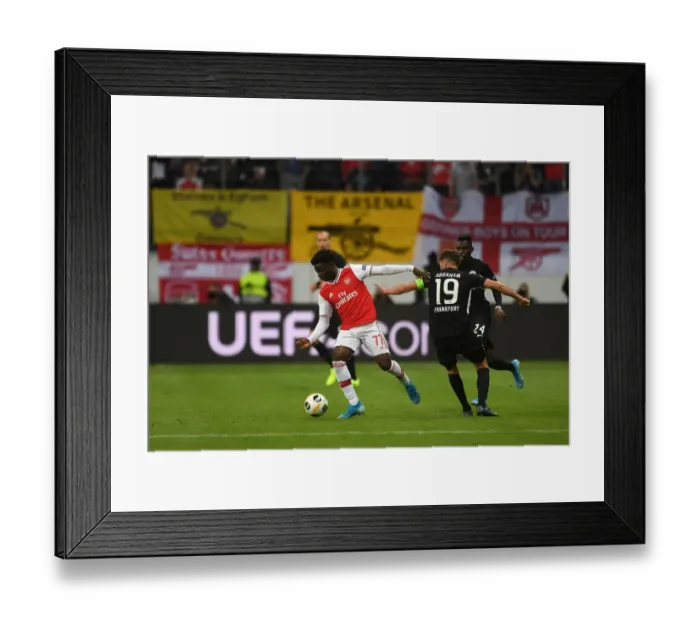 Framed Print : Bukayo Saka Clashes with David Abraham: Eintracht Frankfurt vs. Arsenal, UEFA Europa League 2019-20 Framed Print : Bukayo Saka Clashes with David Abraham: Eintracht Frankfurt vs. Arsenal, UEFA Europa League 2019-20