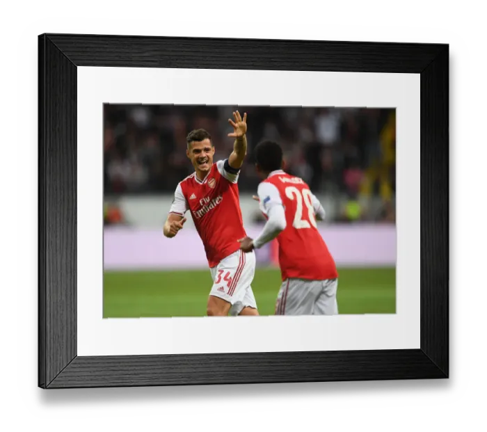 Framed Print : Arsenal's Joe Willock Scores in Europa League Victory over Eintracht Frankfurt: Granit Xhaka Celebrates Framed Print : Arsenal's Joe Willock Scores in Europa League Victory over Eintracht Frankfurt: Granit Xhaka Celebrates