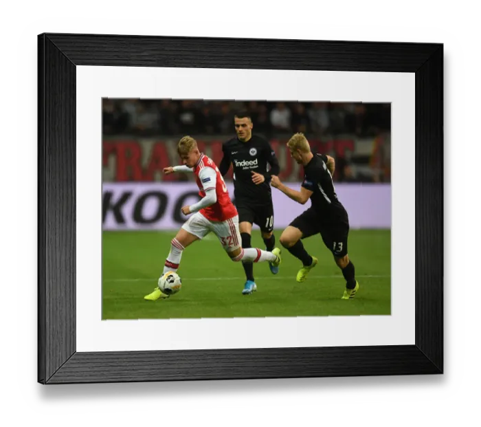 Framed Print : Emile Smith Rowe vs. Martin Hinteregger: Clash in the Europa League between Eintracht Frankfurt and Arsenal FC Framed Print : Emile Smith Rowe vs. Martin Hinteregger: Clash in the Europa League between Eintracht Frankfurt and Arsenal FC
