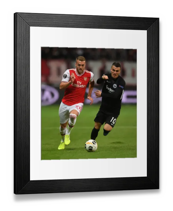 Framed Print : Chambers vs. Kostic: A Europa League Battle at the Heart of Arsenal-Eintracht Clash