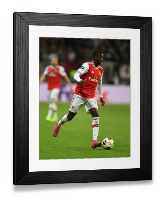 Framed Print : Arsenal's Nicolas Pepe in Action: Europa League Showdown against Eintracht Frankfurt Framed Print : Arsenal's Nicolas Pepe in Action: Europa League Showdown against Eintracht Frankfurt