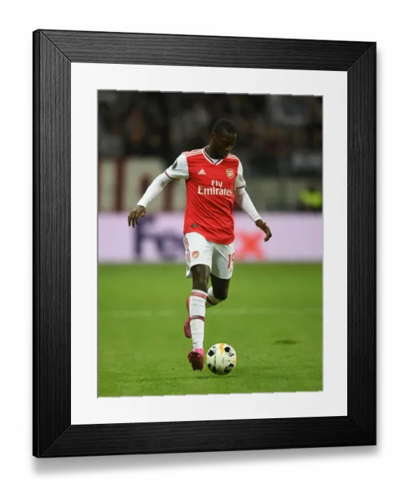 Framed Print : Arsenal's Nicolas Pepe in Action: Europa League Showdown vs. Eintracht Frankfurt Framed Print : Arsenal's Nicolas Pepe in Action: Europa League Showdown vs. Eintracht Frankfurt