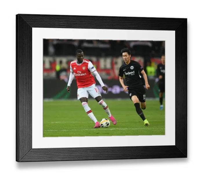Framed Print : Pepe vs Kamada: Clash of Wings in Europa League's Group F - Arsenal vs Eintracht Frankfurt Framed Print : Pepe vs Kamada: Clash of Wings in Europa League's Group F - Arsenal vs Eintracht Frankfurt