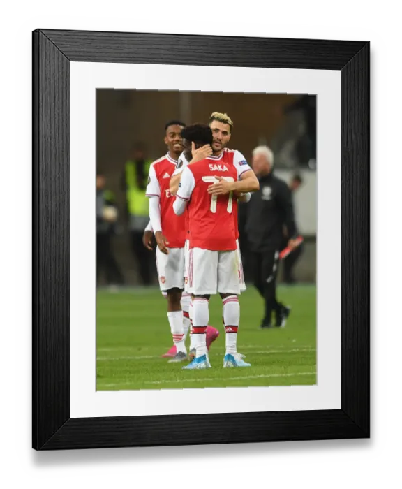 Framed Print : Arsenal's Kolasinac and Saka Celebrate Victory over Eintracht Frankfurt in Europa League