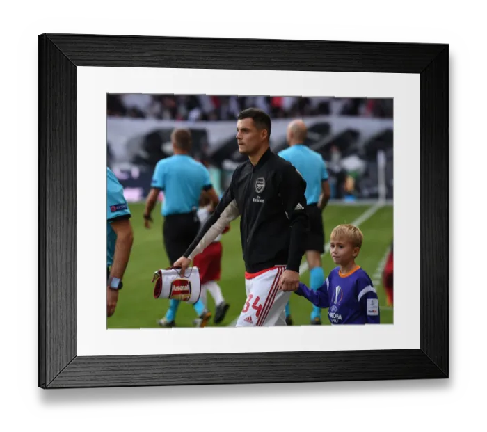 Framed Print : Granit Xhaka Gears Up: Arsenal vs. Eintracht Frankfurt, UEFA Europa League 2019-20