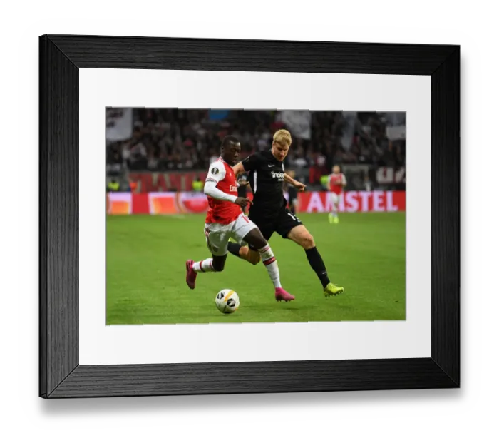 Framed Print : Pepe vs. Hinteregger: Clash in the Europa League - Eintracht Frankfurt vs. Arsenal FC