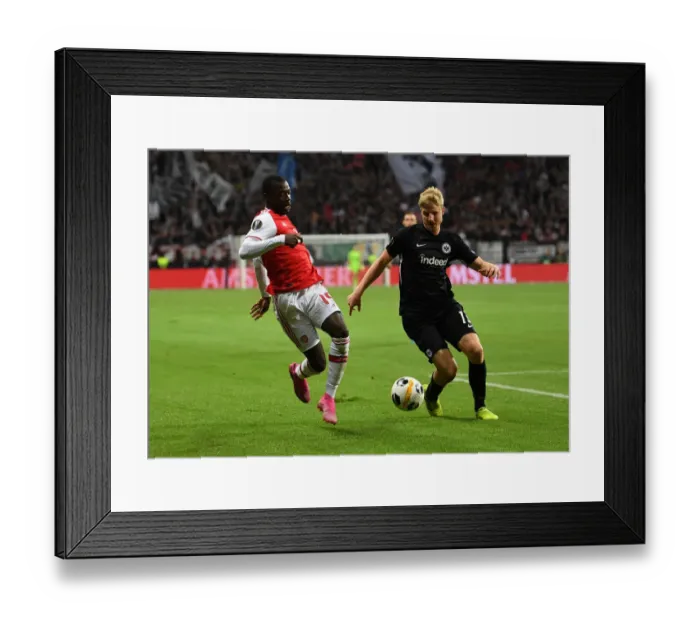 Framed Print : Pepe vs Hinteregger: A Europa League Showdown - Arsenal vs Eintracht Frankfurt (2019-20)