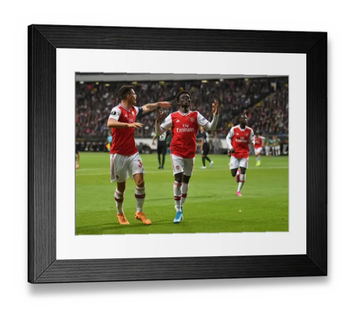 Framed Print : Bukayo Saka's Brace: Arsenal's Europa League Triumph Over Eintracht Frankfurt (September 19, 2019) Framed Print : Bukayo Saka's Brace: Arsenal's Europa League Triumph Over Eintracht Frankfurt (September 19, 2019)