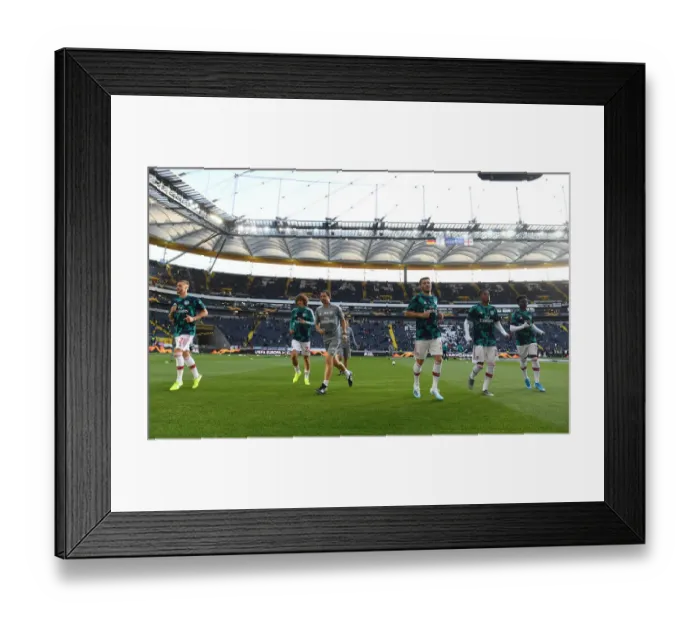 Framed Print : Arsenal FC Warm-Up Ahead of Eintracht Frankfurt Clash in Europa League Group Stage