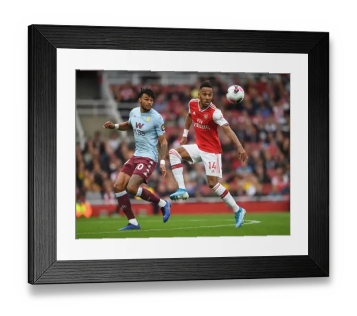 Framed Print : Aubameyang vs. Mings: Unyielding Rivalry in Arsenal vs. Aston Villa's Premier League Battle