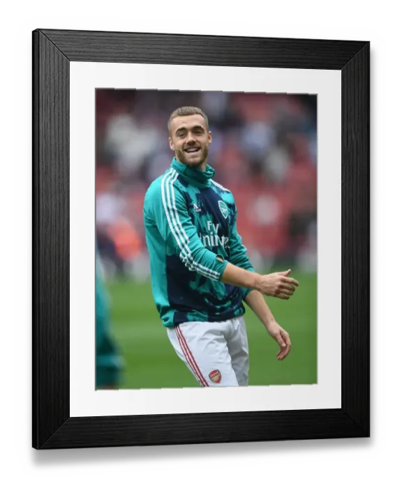 Framed Print : Arsenal's Calum Chambers Gears Up for Arsenal v Aston Villa in Premier League
