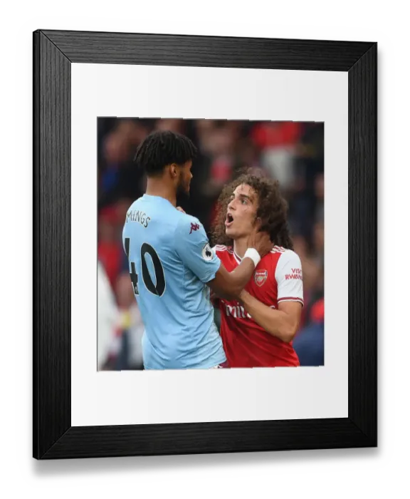 Framed Print : Arsenal vs Aston Villa: Guendouzi and Mings Clash in Premier League Showdown Framed Print : Arsenal vs Aston Villa: Guendouzi and Mings Clash in Premier League Showdown