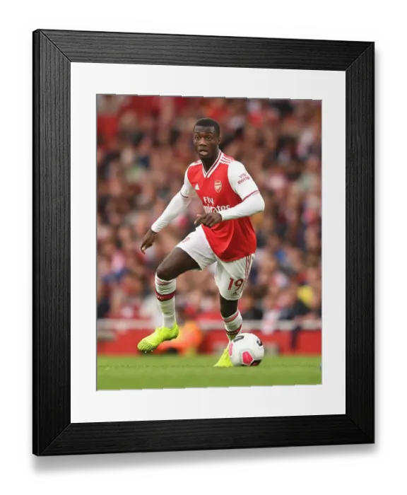 Framed Print : Arsenal's Pepe Shines in Premier League Clash Against Aston Villa