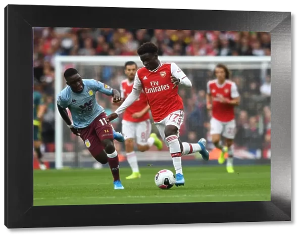 Saka vs. Nakamba: Intense Face-Off in Arsenal vs. Aston Villa Premier League Clash