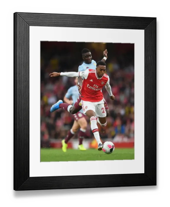 Framed Print : Arsenal vs Aston Villa: Joe Willock Clashes with Marvelous Nakamba in Premier League Showdown