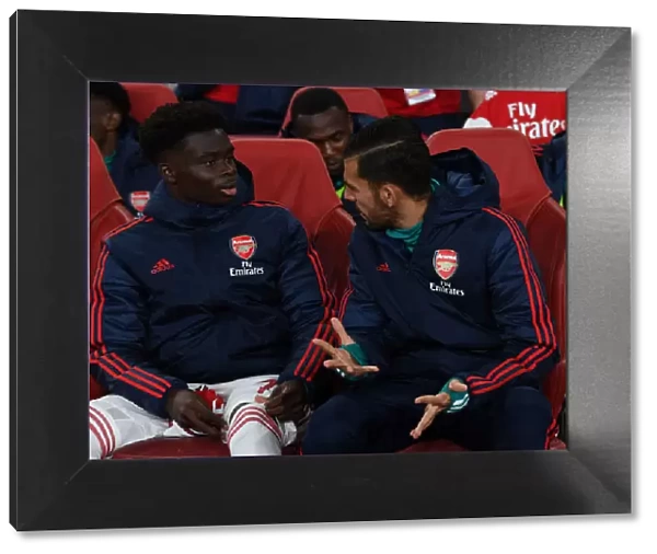 Arsenal FC: Bukayo Saka and Dani Ceballos Sharing a Pre-Match Moment before Arsenal vs Nottingham Forest (Carabao Cup, 2019-20)